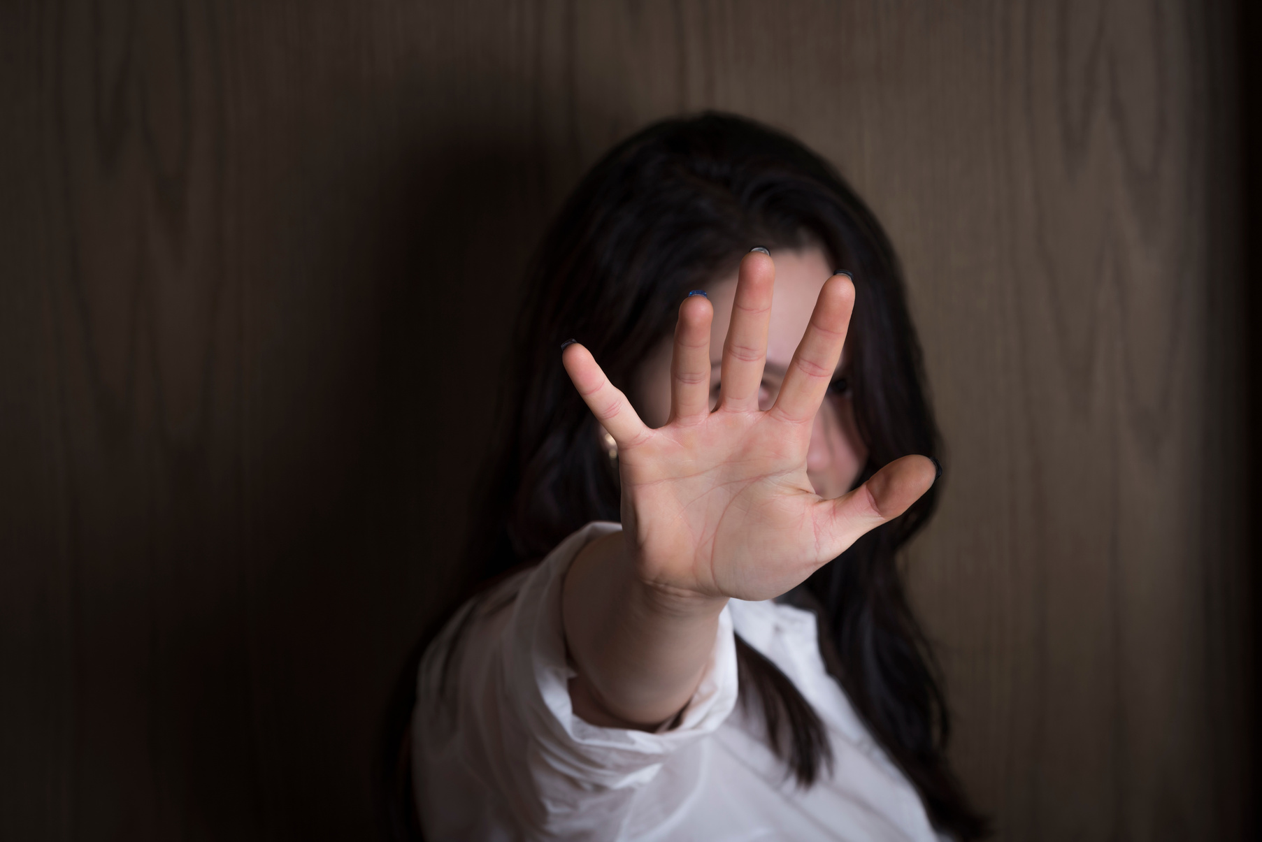 Woman with Hand Stretched as a Stop Symbol